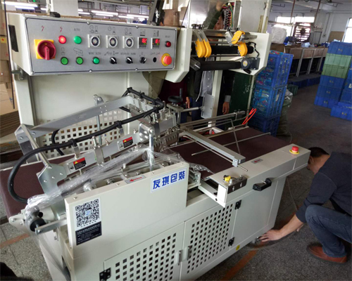全自动套膜收缩机应用于文体用品行业