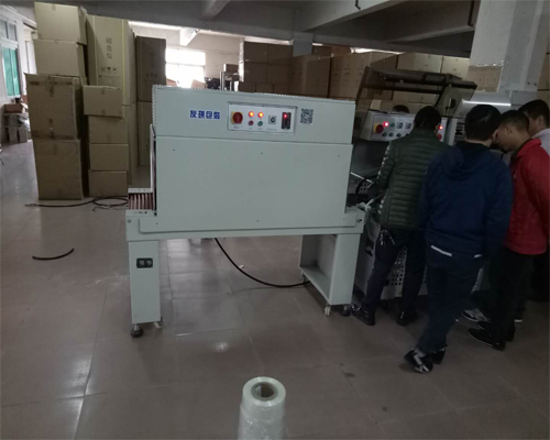 全自动套膜封口收缩包装机应用于艾灸养生器材包装