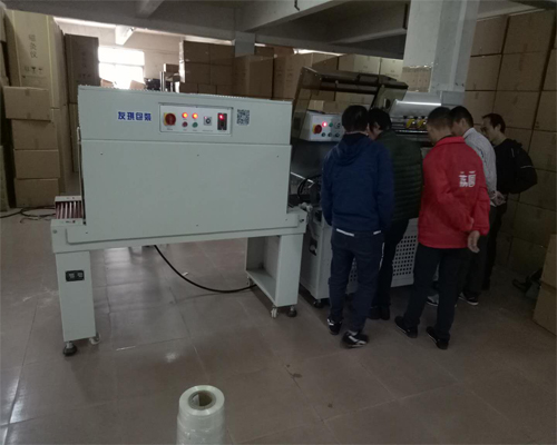 全自动套膜封口收缩包装机应用于艾灸养生器材包装